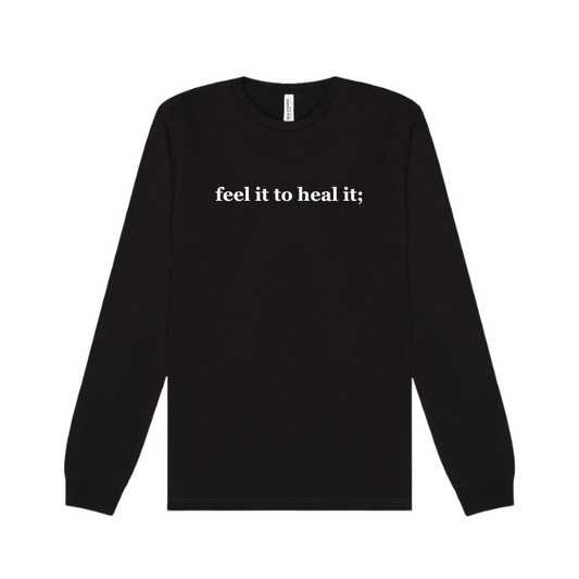 black long sleeve tee emblazoned with the phrase feel it to heal it