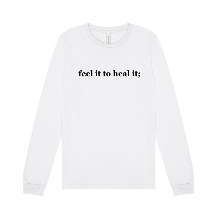 white long sleeve tshirt emblazoned with feel it to heal it.